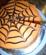 spiderweb cake dragging the icing